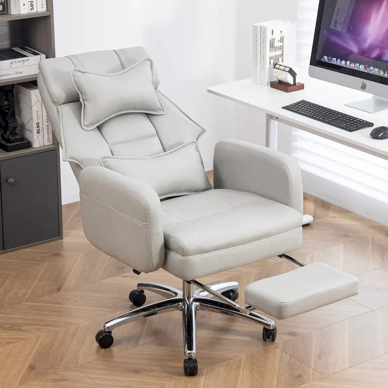 Fauteuil de bureau inclinable pivotant en cuir gris clair, support lombaire, repose-pieds