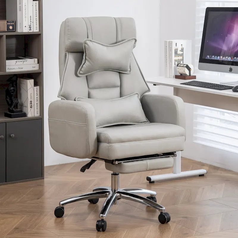 Fauteuil de bureau inclinable pivotant en cuir gris clair, support lombaire, repose-pieds