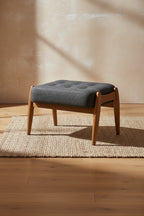 Repose-pieds ottoman en tissu gris foncé et bois finition noyer